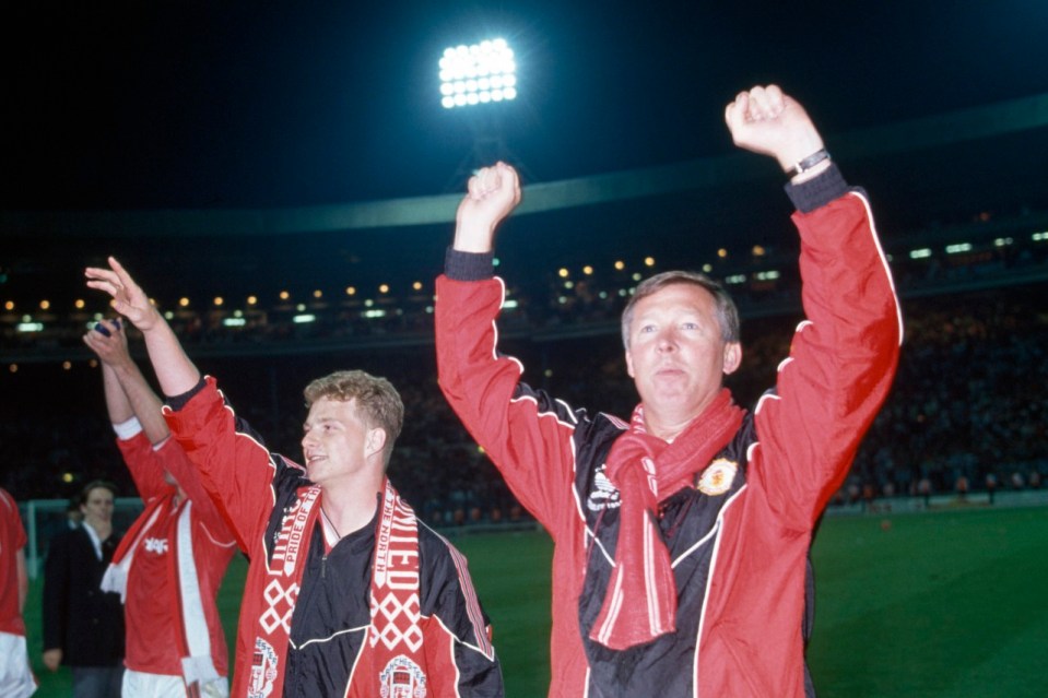 LONDON, UNITED KINGDOM - MAY 17:  Manchester United manager Alex Ferguson (right) alongside Mark Robins as they celebrate United's victory in the FA Cup Final replay against Crystal Palace at Wembley Stadium on May 17, 1990 in London, England. Manchester United won 1-0. (Photo by Professional Sport/Popperfoto via Getty Images/Getty Images)