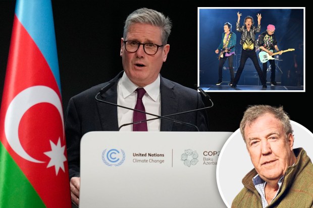 a man stands behind a podium that says united nations climate change