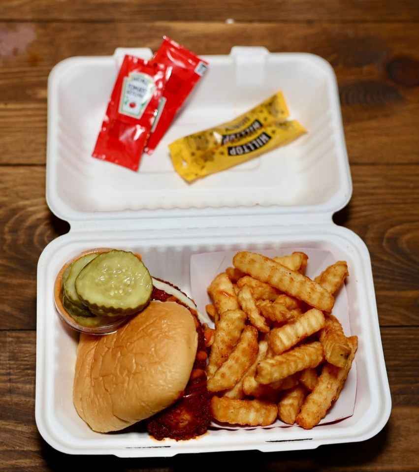 Chicken slider meal with chips, gherkins and burger dipping sauce