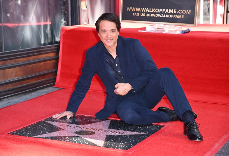 Karate Kid star Ralph Macchio poses with his new star on the Hollywood Walk Of Fame