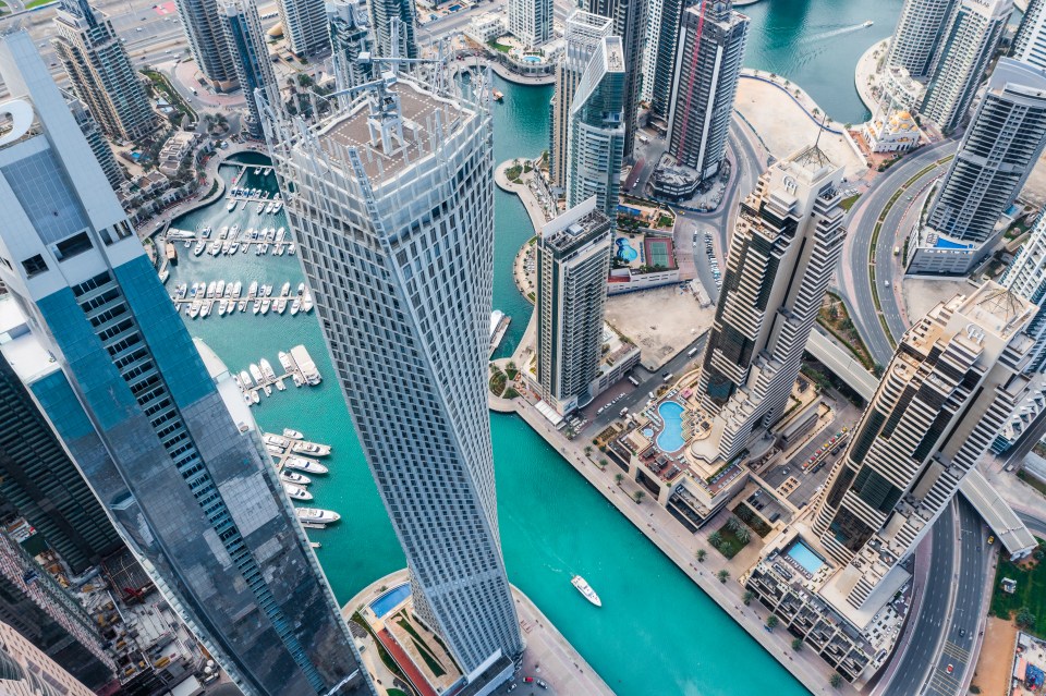 an aerial view of a city with a river running through it