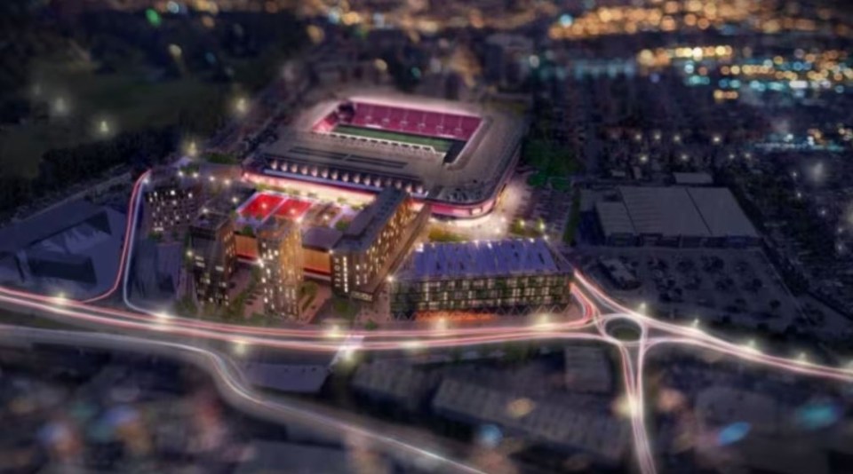 an aerial view of a soccer stadium at night