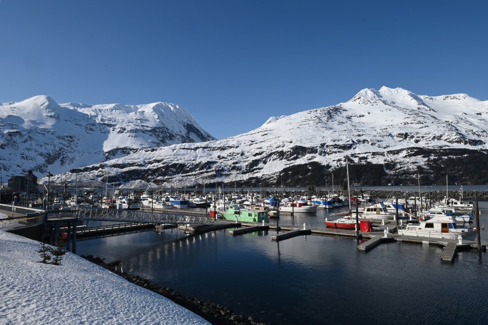 Whittier also has its own harbour nestled between the frosty Alaska mountains