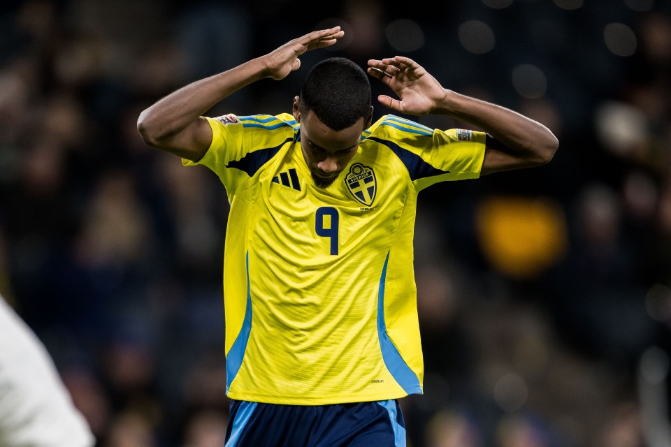 a soccer player wearing a yellow jersey with the number 9 on it