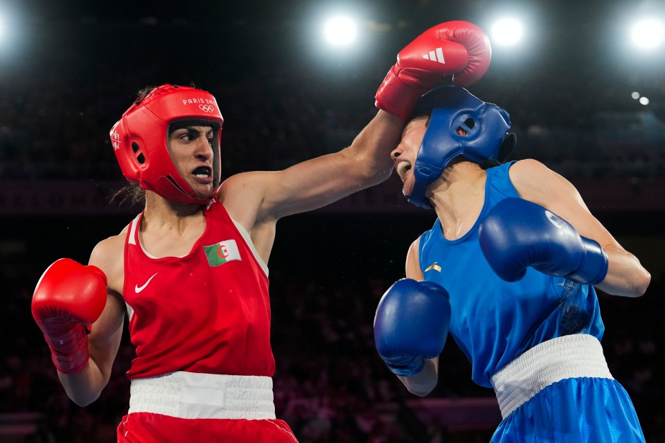 two boxers are fighting with one wearing a helmet that says peroni