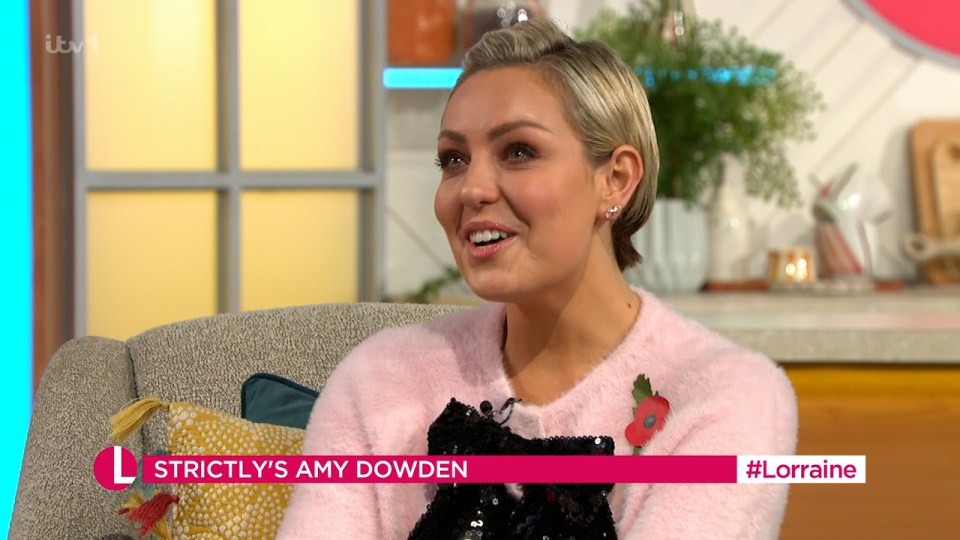 Amy, 34, choked up as she told host Lorraine Kelly she wanted to 'show myself how far I have come' a year after wrapping her cancer treatment