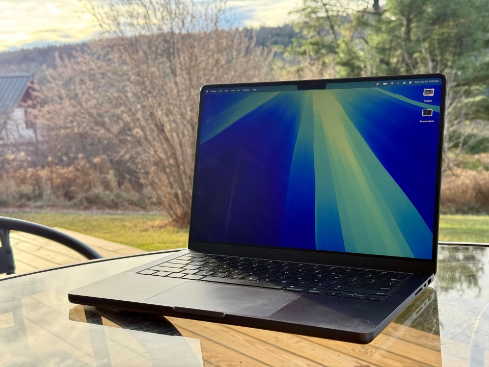 a laptop is open to a screen that says ' windows ' on it