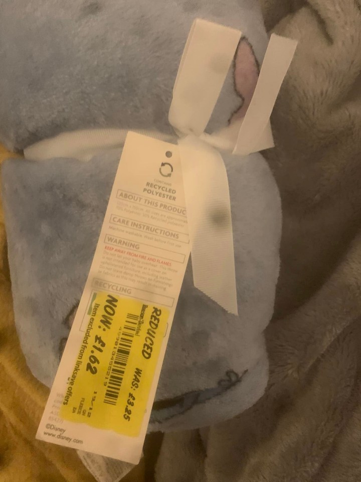 a stuffed animal with a tag that says reduced