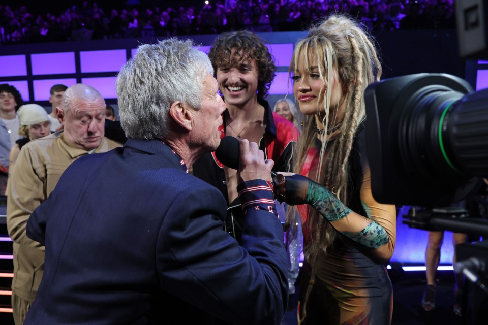 Bez was seen trying to take the mic off Rita during the segment