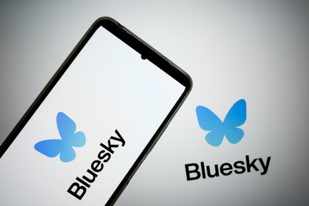 a phone with the bluesky logo on the screen