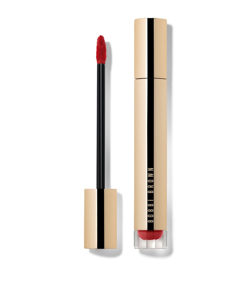 a bottle of bobbi brown liquid lipstick with a red shade