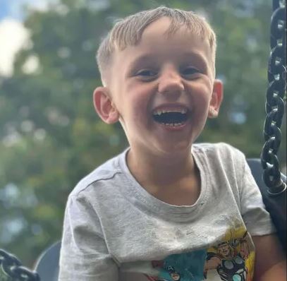 Little Carlos Crane, four, is fighting for his life after a 'hit-and-run' crash