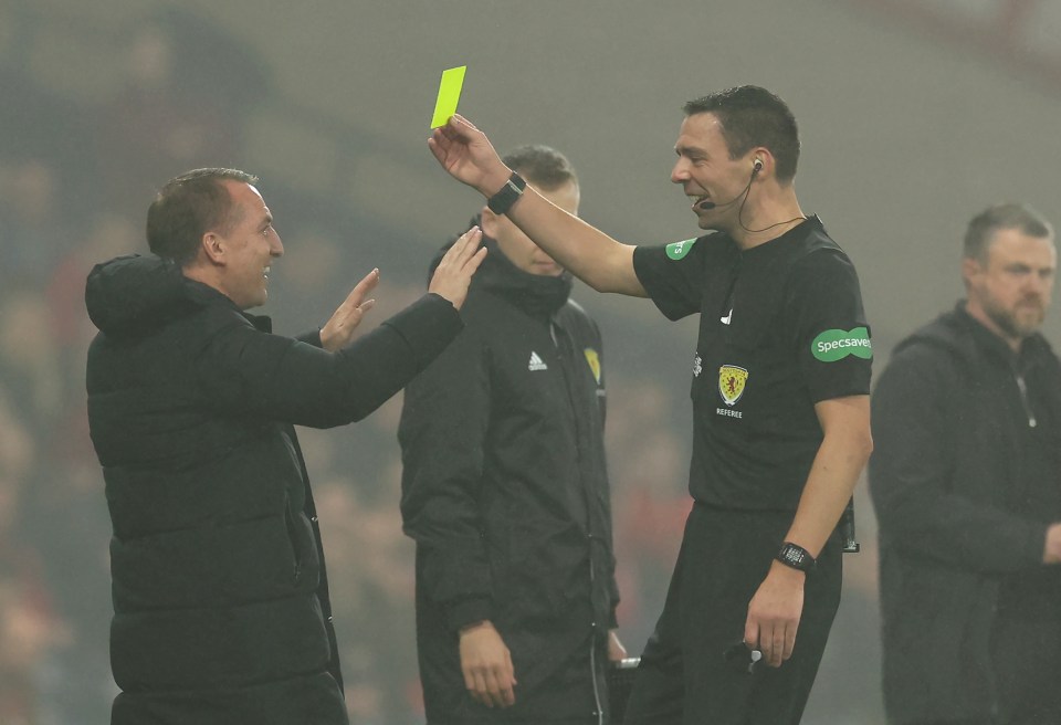 Referee Kevin Clancy laughed as he booked the Celtic manager