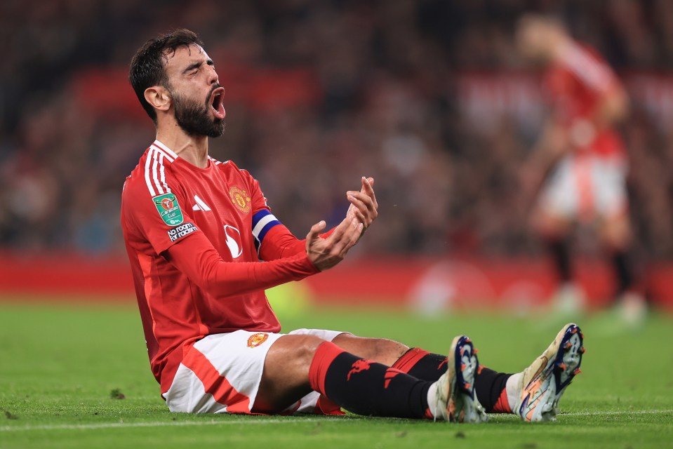 a soccer player wearing a jersey that says ' champions league ' on it