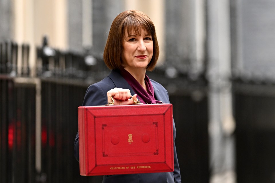 a woman holding a red briefcase that says ' secretary of the exchequer ' on it