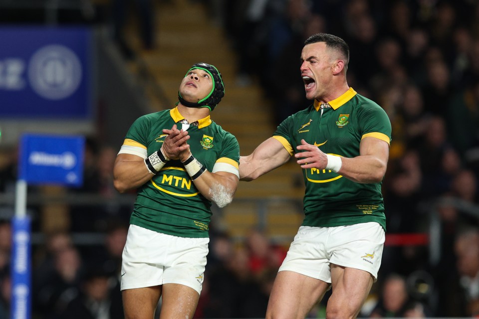 Cheslin Kolbe and Jesse Kriel celebrate as the Boks held on to win