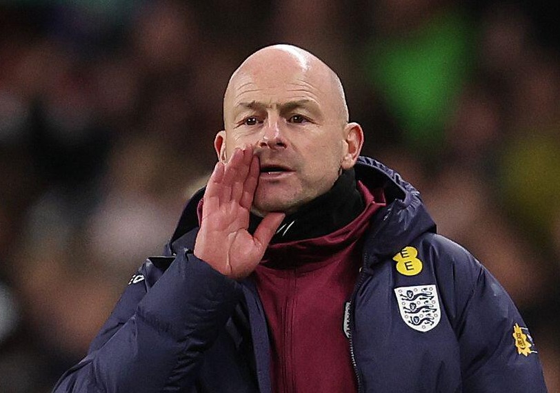 a man wearing a jacket with the word england on it