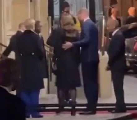 William affectionately put his arm around his wife as they stepped from their car outside the Royal Albert Hall