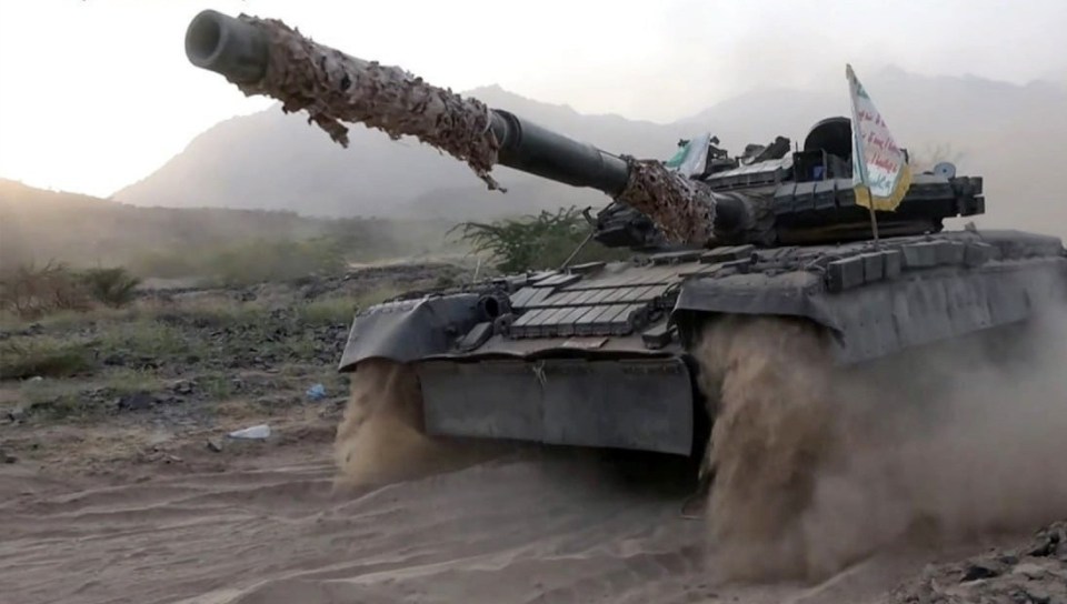 a tank with a flag on top that says ' islamic republic of iraq '