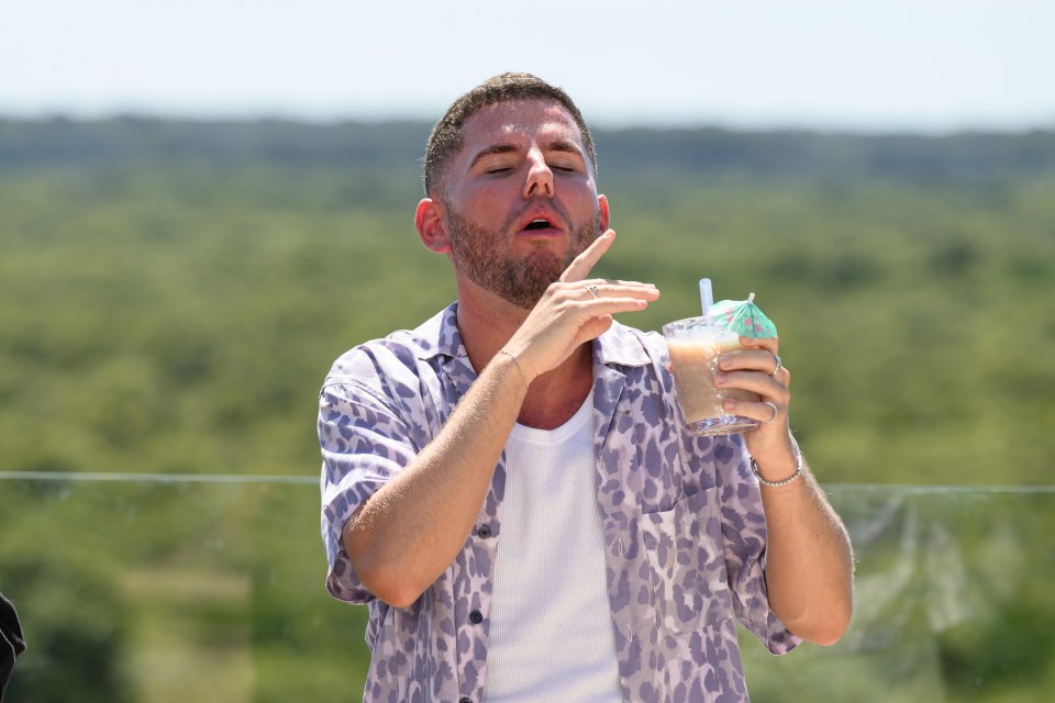 A RADIO 1 star gags as he’s forced to drink blended bull’s penis just seconds after meeting his castmates in a stomach-churning moment