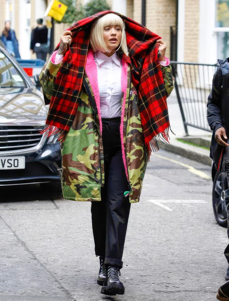 Rita Ora steps out in a Dry Robe winter coat