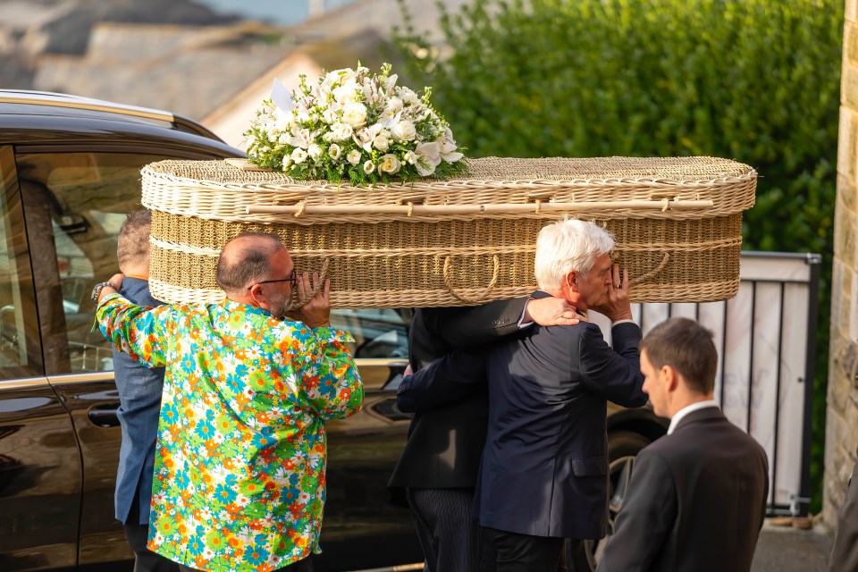 Phillip Schofield carried his late mum Patricia's casket at her funeral yesterday