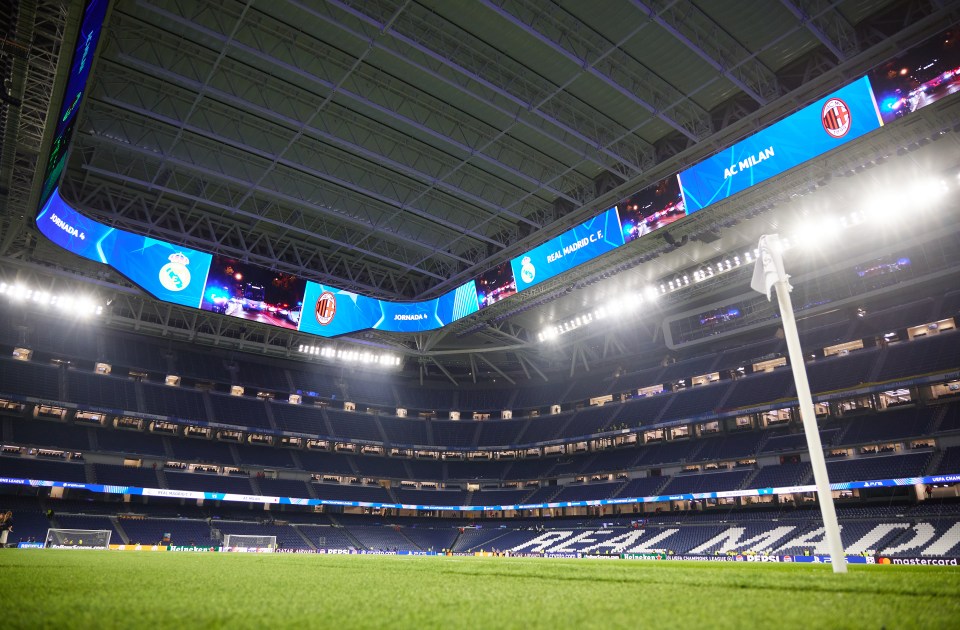 a soccer stadium with the word real madrid on the field