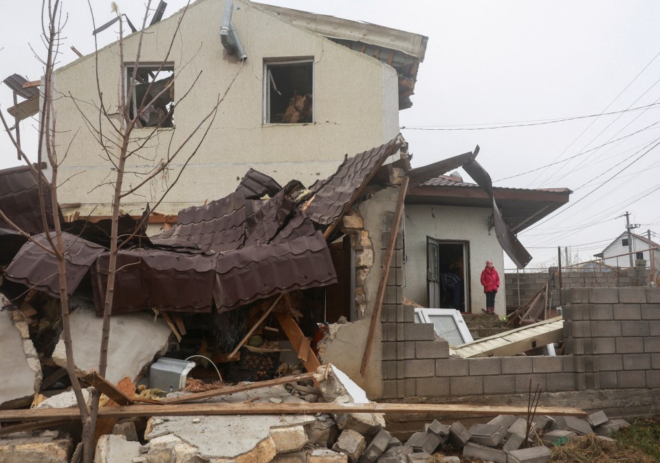 A destroyed house in Ukraine today following Russia's 90 missile blitz attack