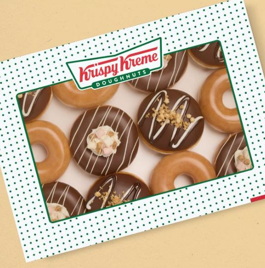 a box of krispy kreme doughnuts on a table