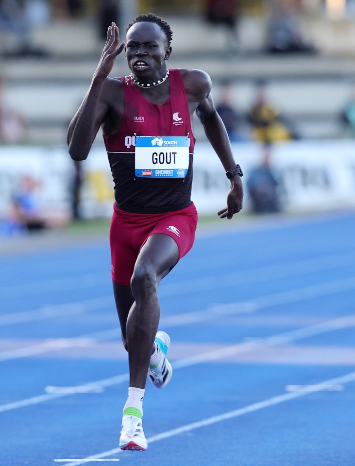 a runner named gout is running on a track