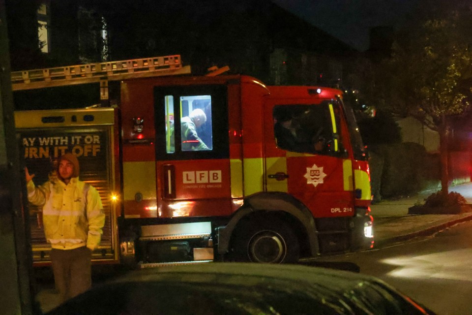 a red and yellow fire truck with the letters lfd on the side