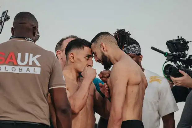 AnEsonGib facing off with Slim Albaher ahead of their fight