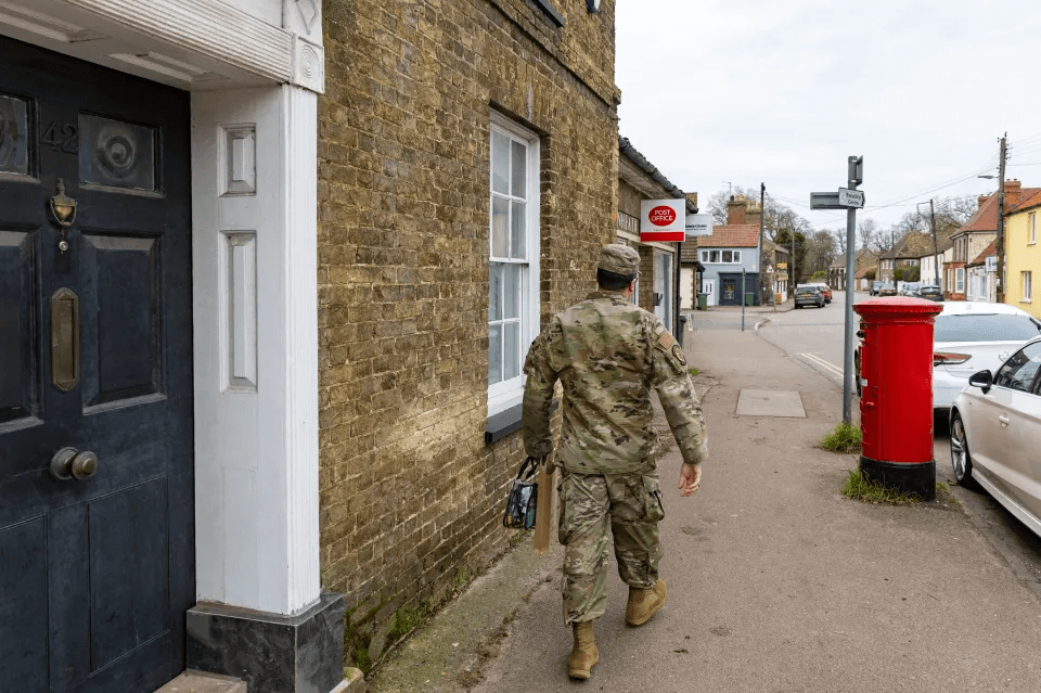 A USAF Soldier using the local Post Office