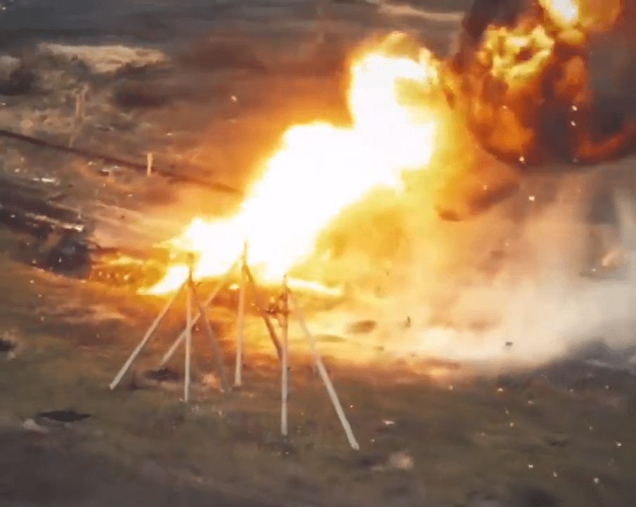 A suicide UAV detonates as it smashes into a £1million Russian T-72 tank