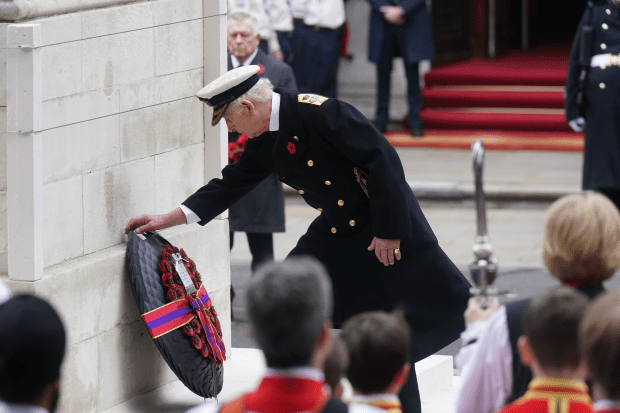 King Charles laying a wreath at the foot of the Cenotaph