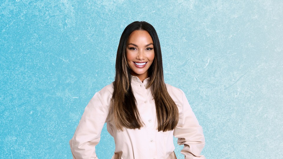 a woman in a white shirt is smiling in front of a blue background