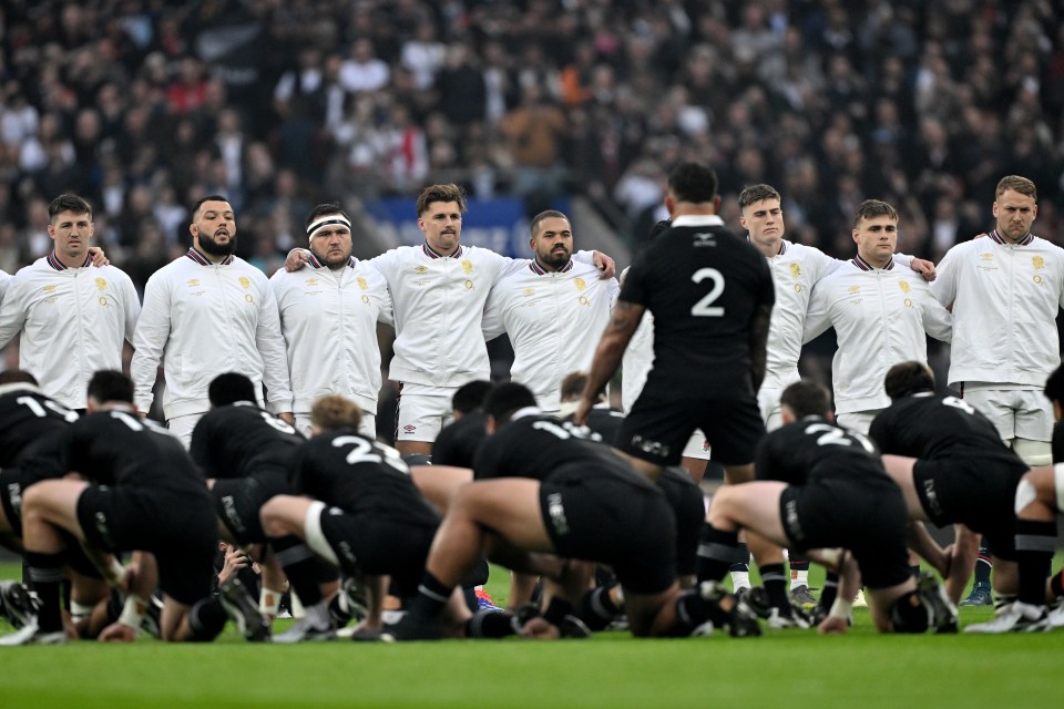 England players stood defiantly during the haka