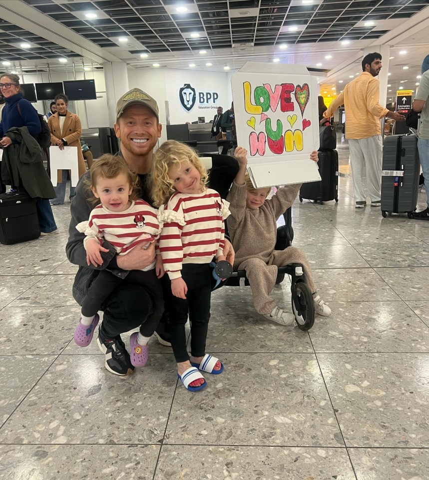 Joe waiting to welcome Stacey home with Belle, Rose and Rex