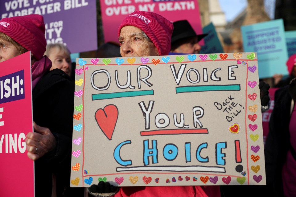 A supporter of assisted dying outside Parliament