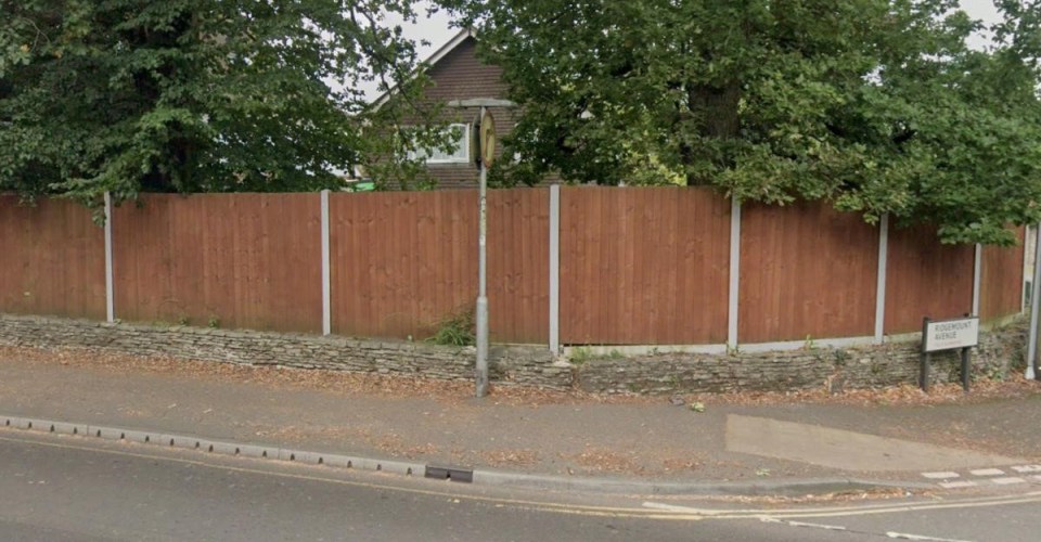 Khan built the timber fence on top of an existing brick wall