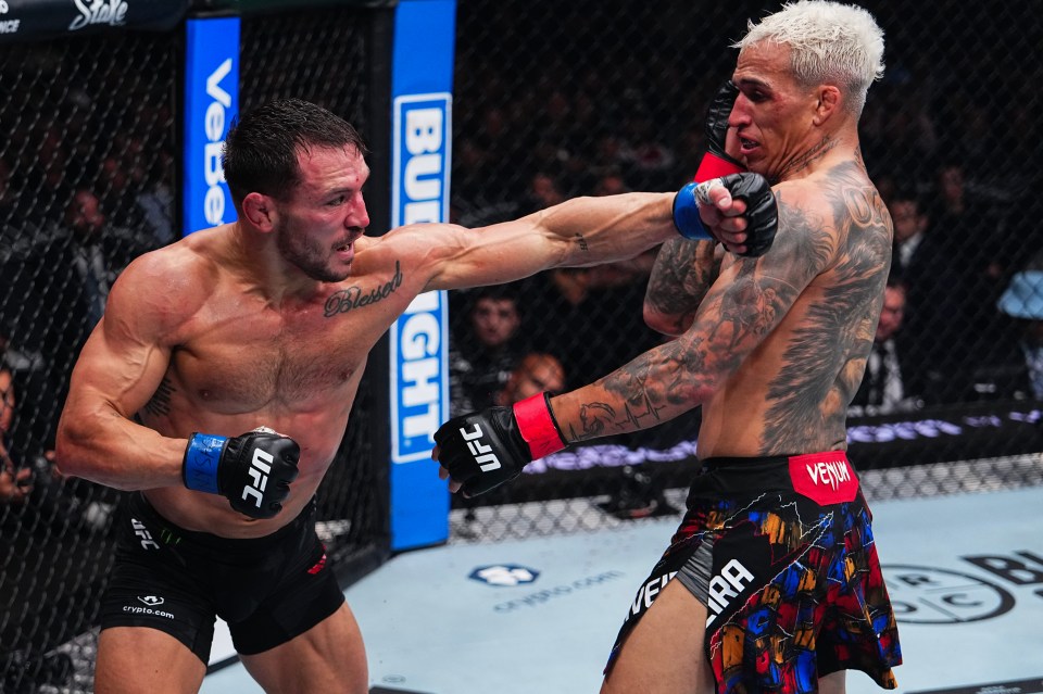 Michael Chandler went to war with Charles Oliveira in their rematch at UFC 309