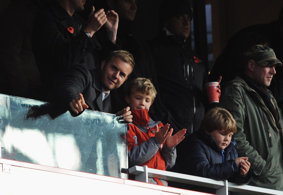 Gary with his son Daniel at an Arsenal v Manchester United game at the Emirates Stadium in 2008