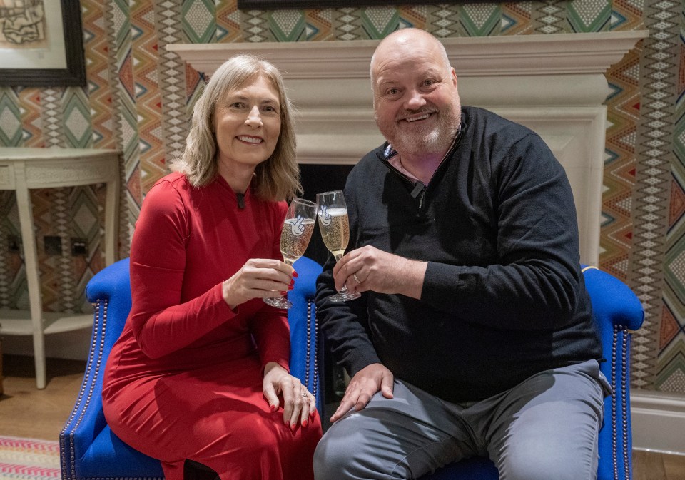 a man and a woman toasting with champagne glasses