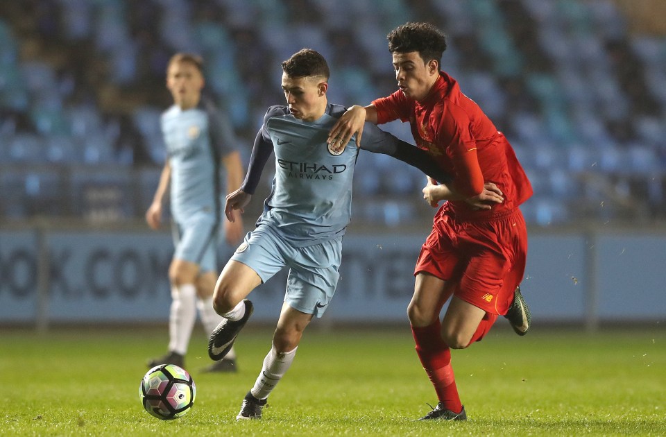 Man City’s Phil Foden battles for the ball with Jones during a 2017 FA Youth Cup game