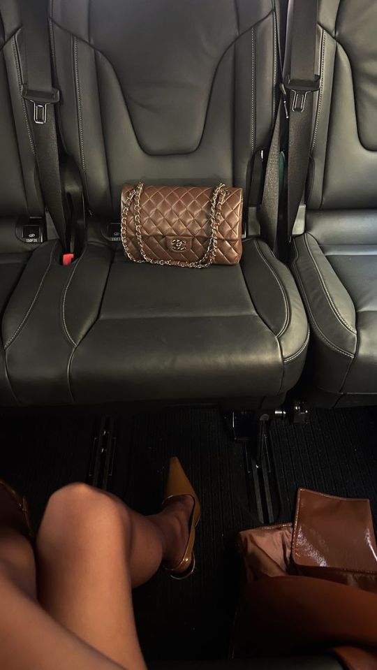 The leggy brunette captured a picture inside a cab with her Chanel bag