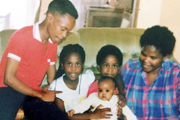 Neo with his sisters and their mother in South Africa