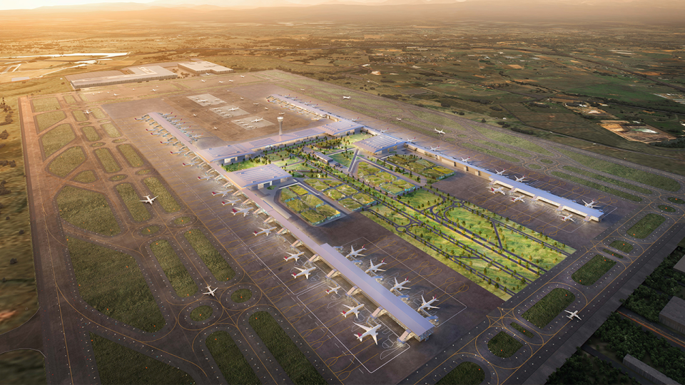 an aerial view of an airport with planes on the tarmac