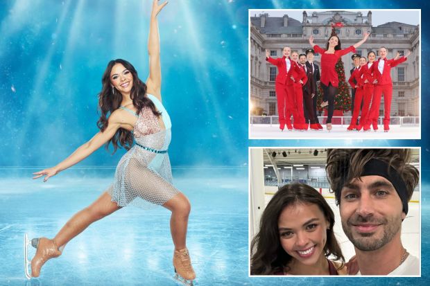 a group of people are standing on a ice rink