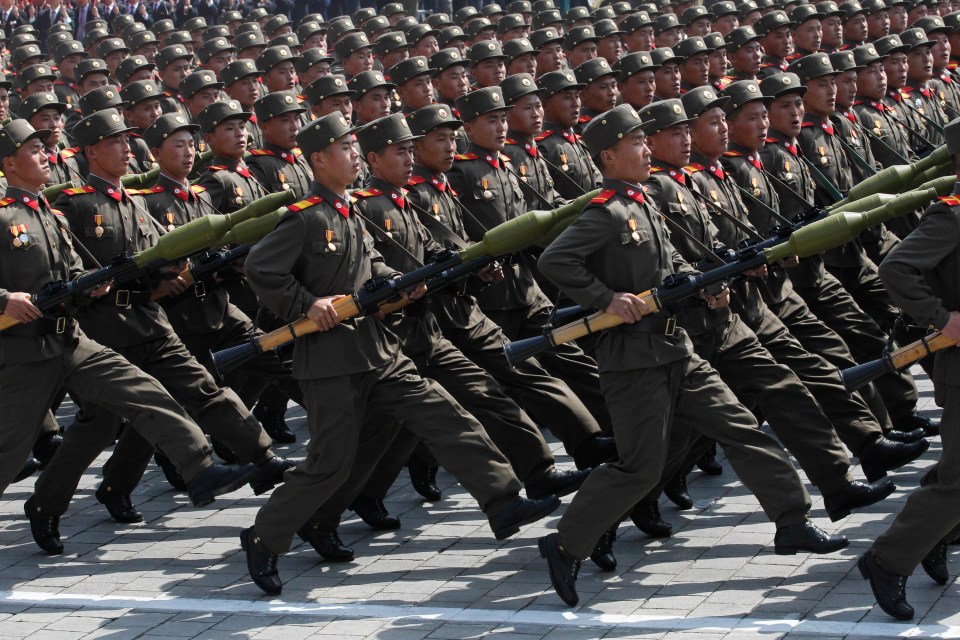 North Korean soldiers march during a mass military parade in Pyongyang’s Kim Il Sung Square