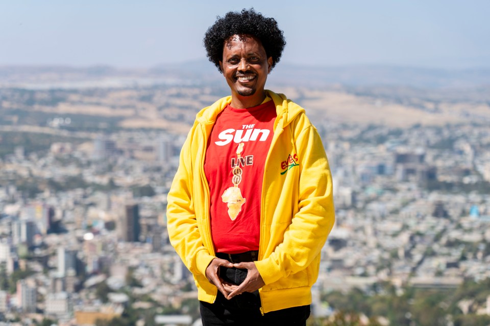 Proud charity worker Bisrat Mesfin in Sun T-shirt from working at Live 8